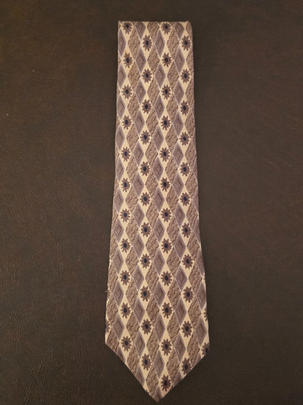 AXXA Tie Silk in Brown/Beige with a Geometric Pattern and Blue Floral Medallions